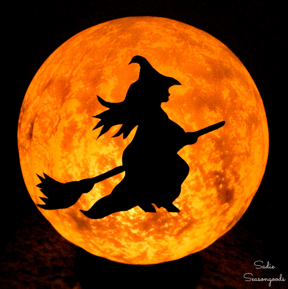 Halloween Moon and Witch Decor from a Glass Globe Light Fixture